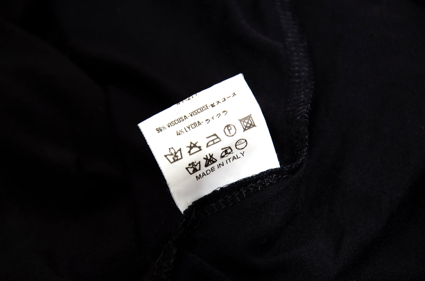 Vintage PierAntonioGaspari minimal black maxi dress with dramatic low back and asymmetrical sleeves