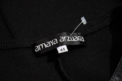 Vestido midi sin mangas de piel y punto vintage de Amaya Arzuaga / Hecho en España