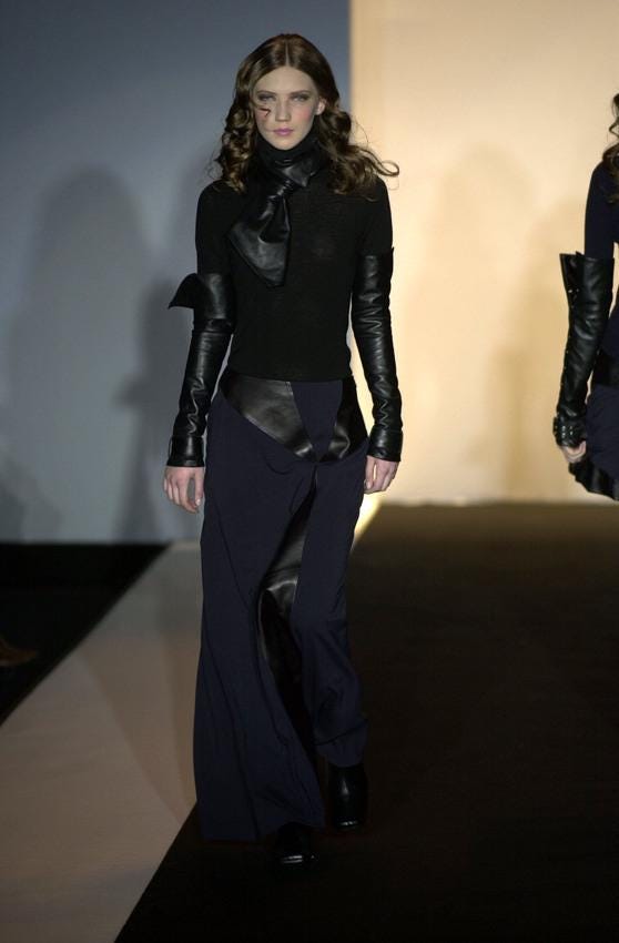 F/W 2001 Simultaneous avant garde black wool skirt with leather inserts / Made in Italy