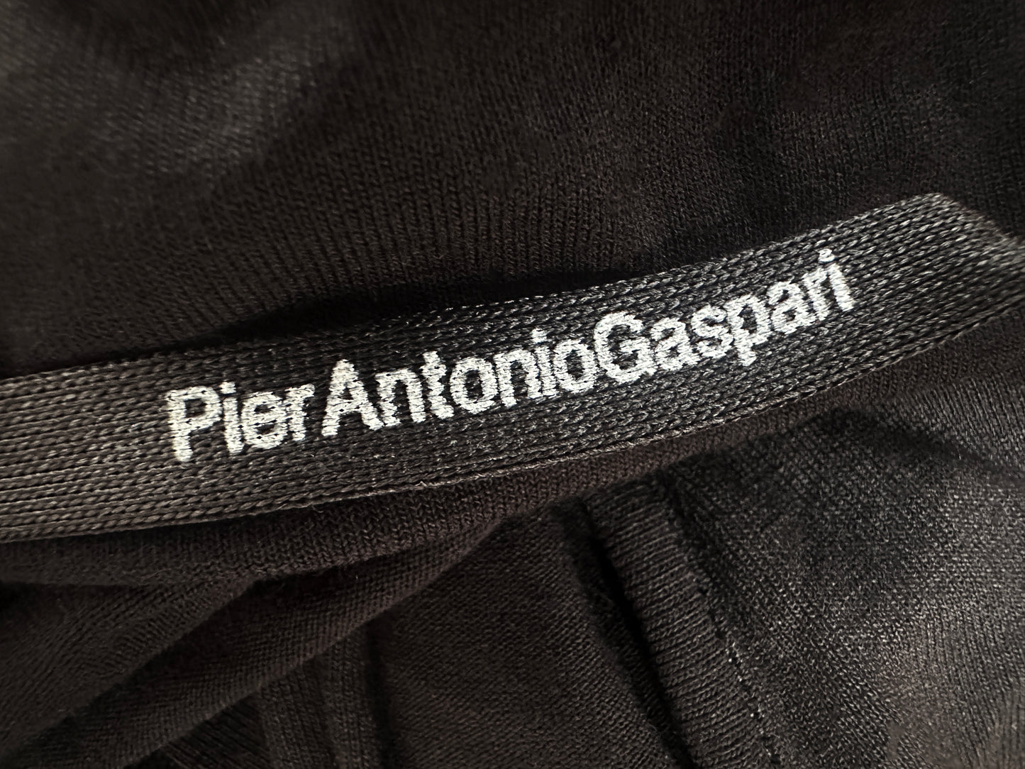 Vintage PierAntonioGaspari minimal black maxi dress with dramatic low back and asymmetrical sleeves