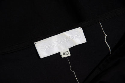 2000s Simultaneous black maxi skirt with white floral embroidery