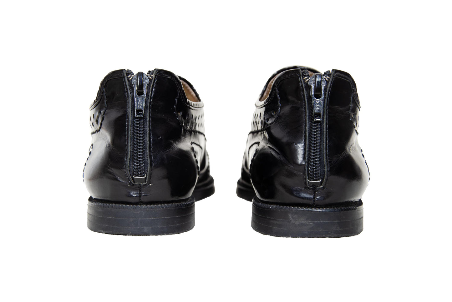 Vintage Yohji Yamamoto black leather perforated slip on shoes with rear zip closure