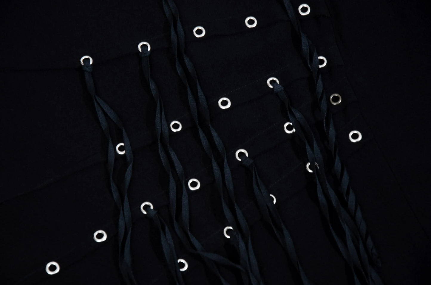 Vintage Jean Colonna black mini skirt with metal eyelets and fabric strips details / Made in Italy