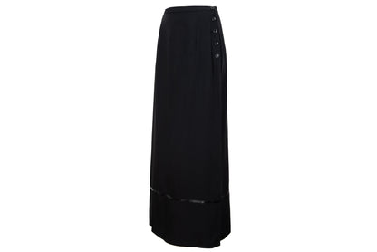 1990s Corinne Sarrut black maxi skirt with side button fastening and satin ribbon detailing