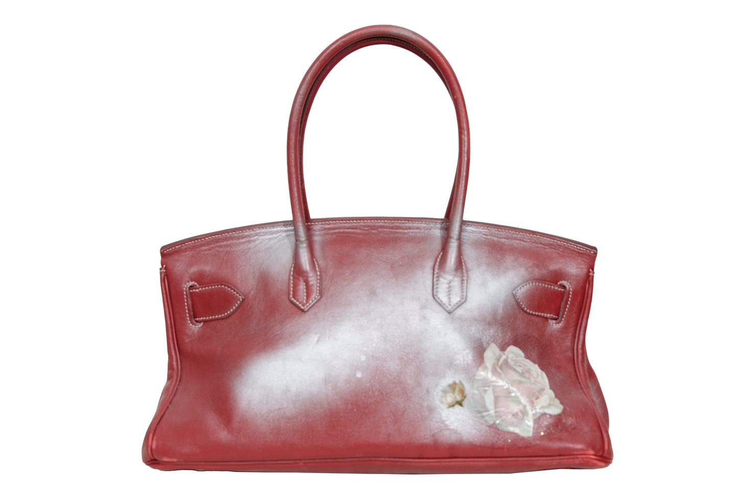 Vintage Italian red leather east west handbag with turn lock closure and floral motif
