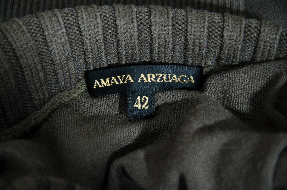 F/W 2001 Amaya Arzuaga olive green knit top with fitted waist and puff sleeves