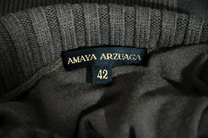 F/W 2001 Amaya Arzuaga olive green knit top with fitted waist and puff sleeves