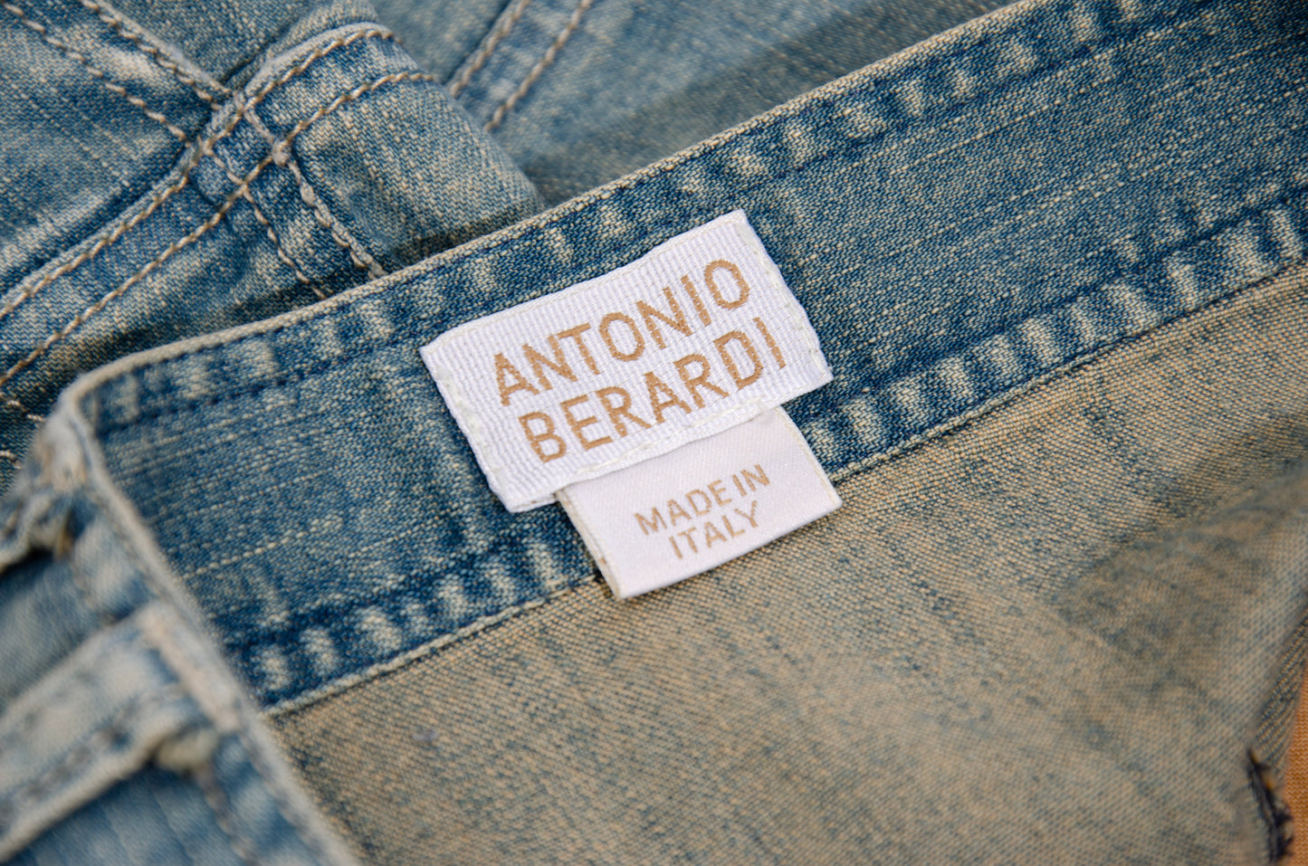2000s Antonio Berardi mini denim skirt with asymmetrical closure and utility pockets