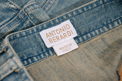 2000s Antonio Berardi mini denim skirt with asymmetrical closure and utility pockets