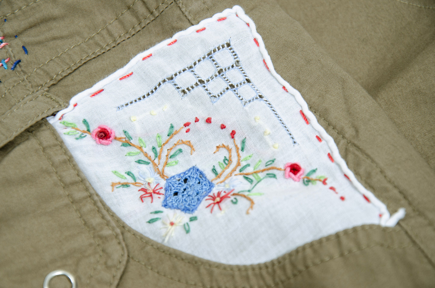 2000s Gaetano Navarra olive ruffled mini skirt with embroideries and decorative stitching