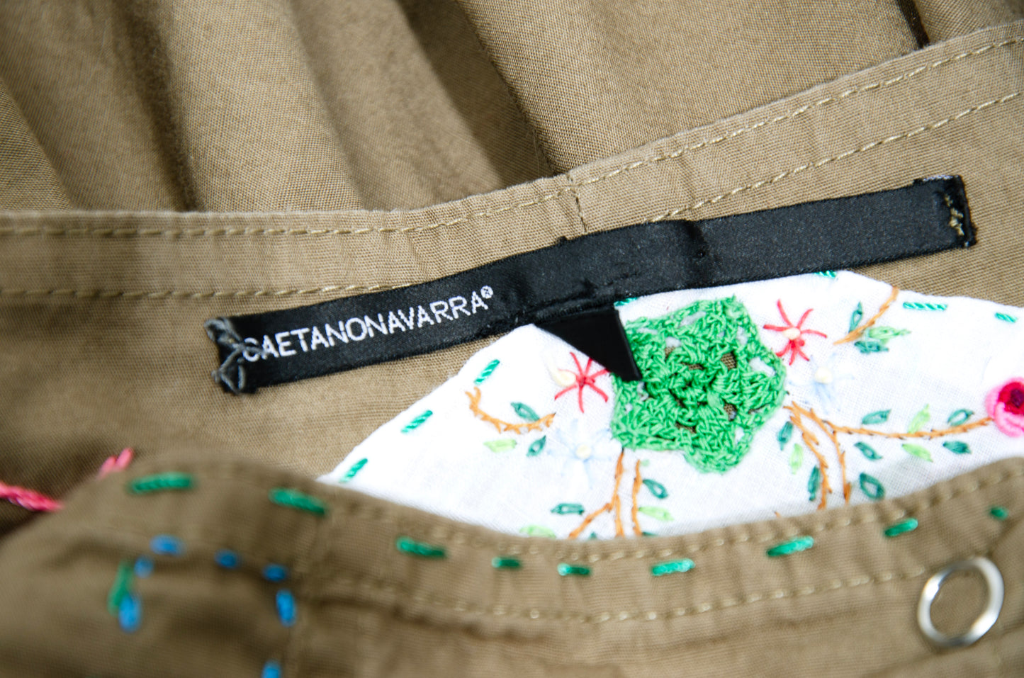 2000s Gaetano Navarra olive ruffled mini skirt with embroideries and decorative stitching