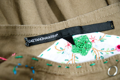 2000s Gaetano Navarra olive ruffled mini skirt with embroideries and decorative stitching