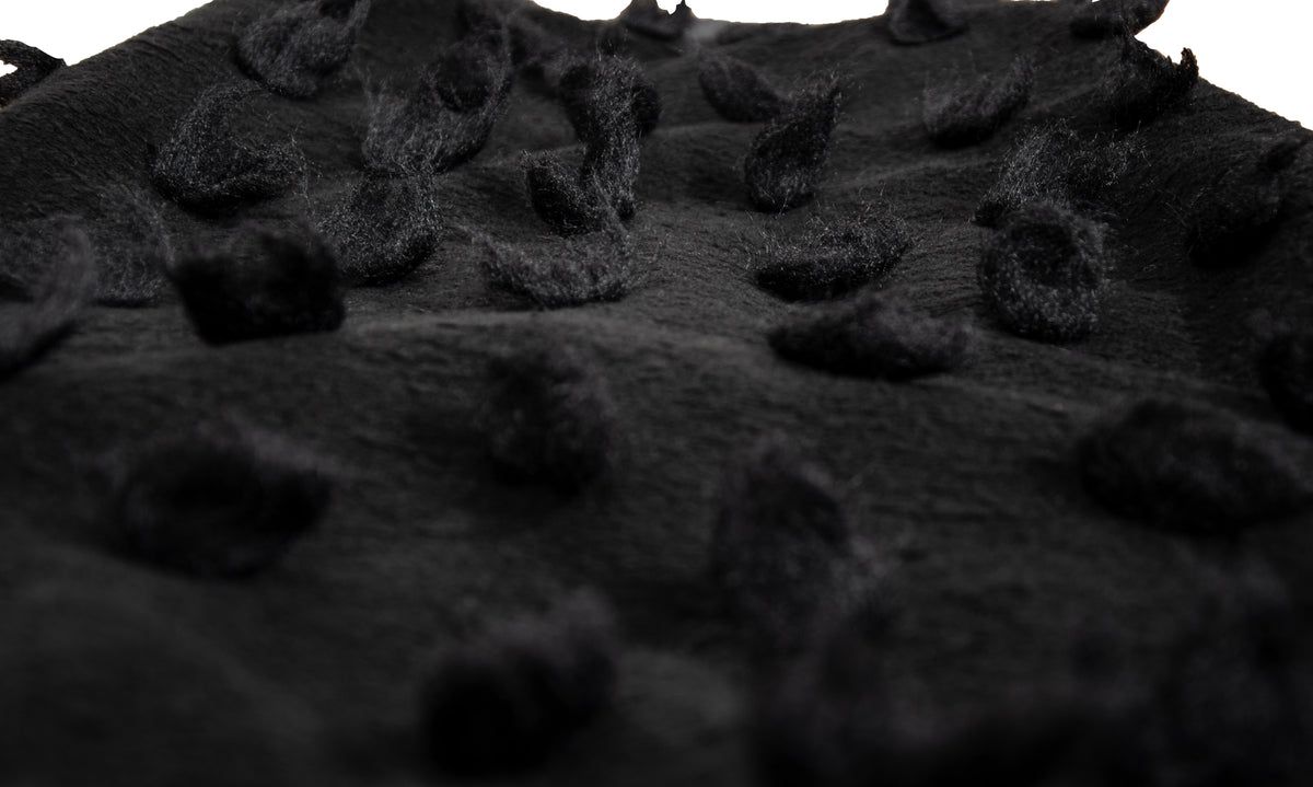 Rare Biche de Bere black boiled wool dress with 3D tufted wool pompom details