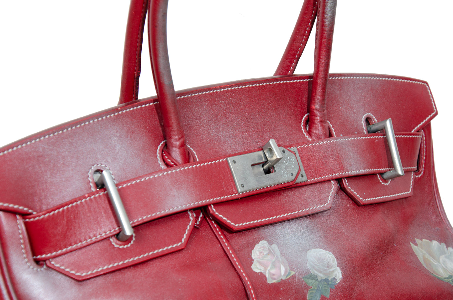 Vintage Italian red leather east west handbag with turn lock closure and floral motif