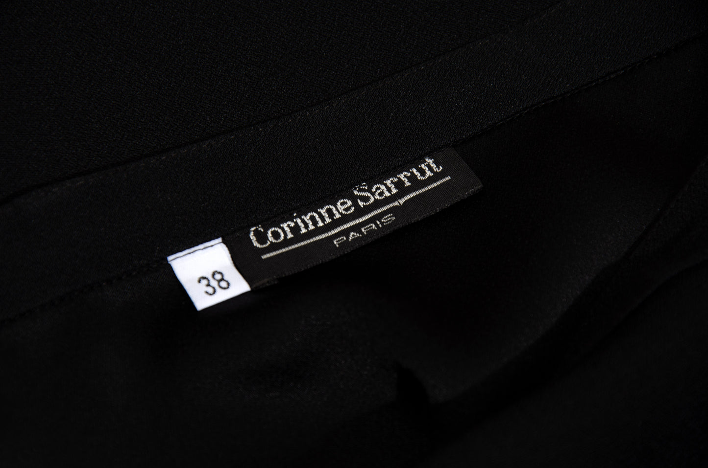 1990s Corinne Sarrut black maxi skirt with side button fastening and satin ribbon detailing