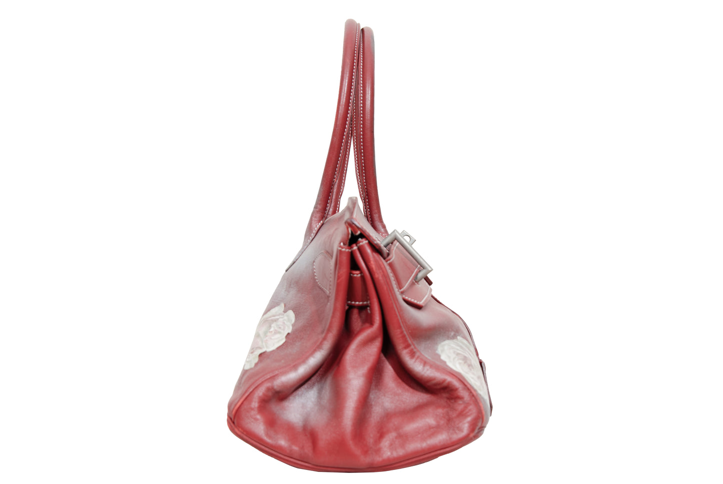 Vintage Italian red leather east west handbag with turn lock closure and floral motif